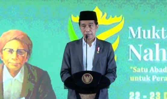 Presiden Republik Indonesia Joko Widodo saat membuka Muktamar ke-34 NU di Lampung Tengah, Rabu (22/12/2021).