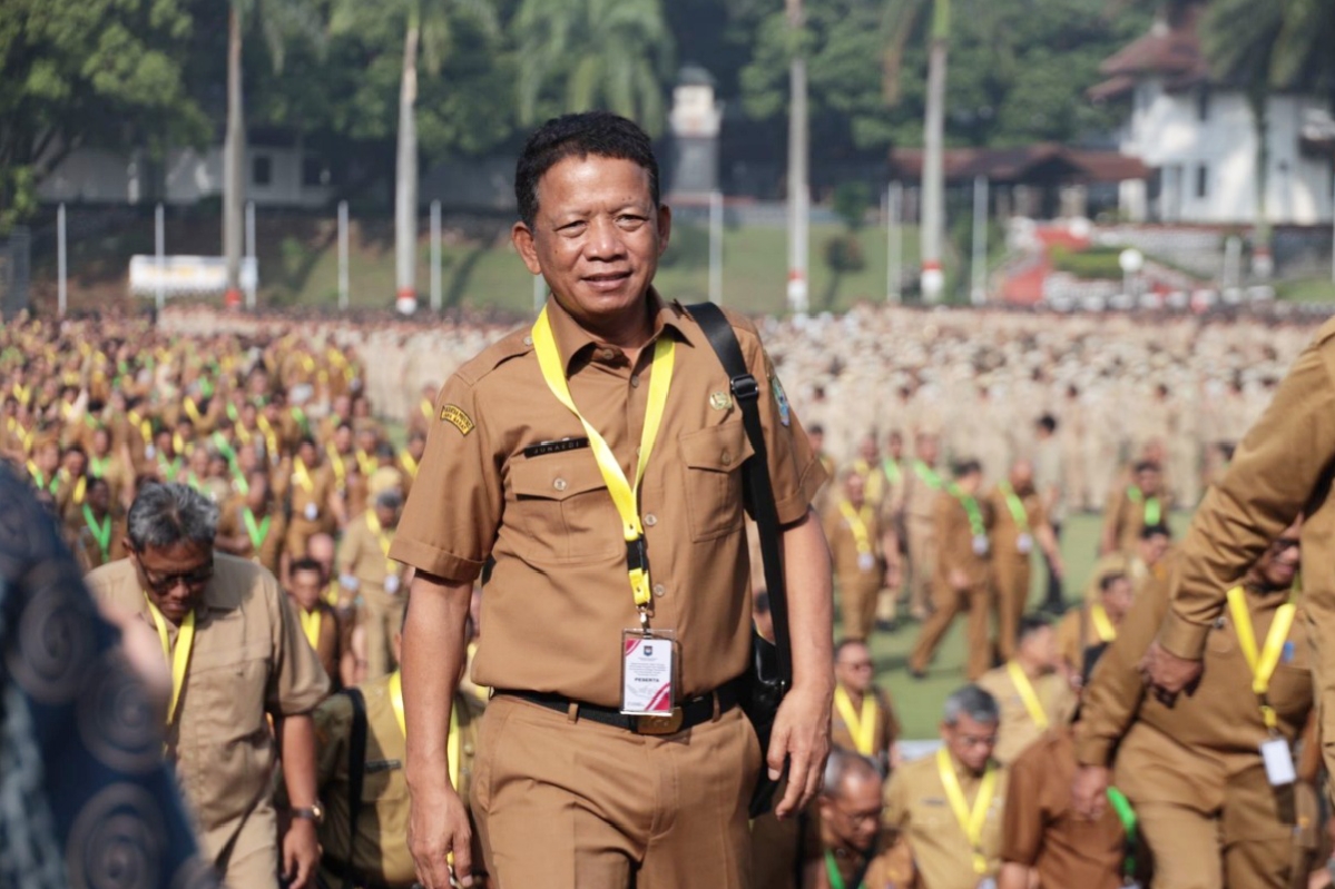 Sekda Kota Bekasi Junaedi saat mengikuti Rakor Sinkronisasi Program dan Kegiatan Kementerian/Lembaga Pemerintah Non Kementerian (LPNK) dengan Pemerintah Daerah Tahun 2025 di Institut Pemerintahan Dalam Negeri (IPDN) Jatinangor, Senin (27/10/2025).